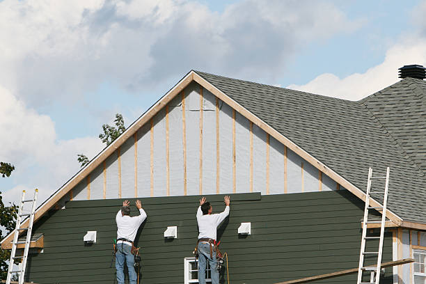 Professional Siding Contractor technician working in Midlothian, VA